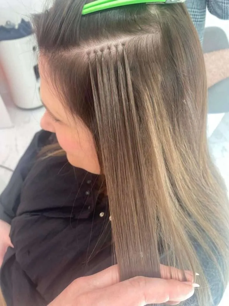 sectioning hair extensions for cutting in layers to blend