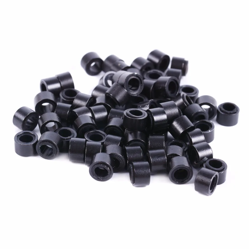 Black micro link rings in a pile