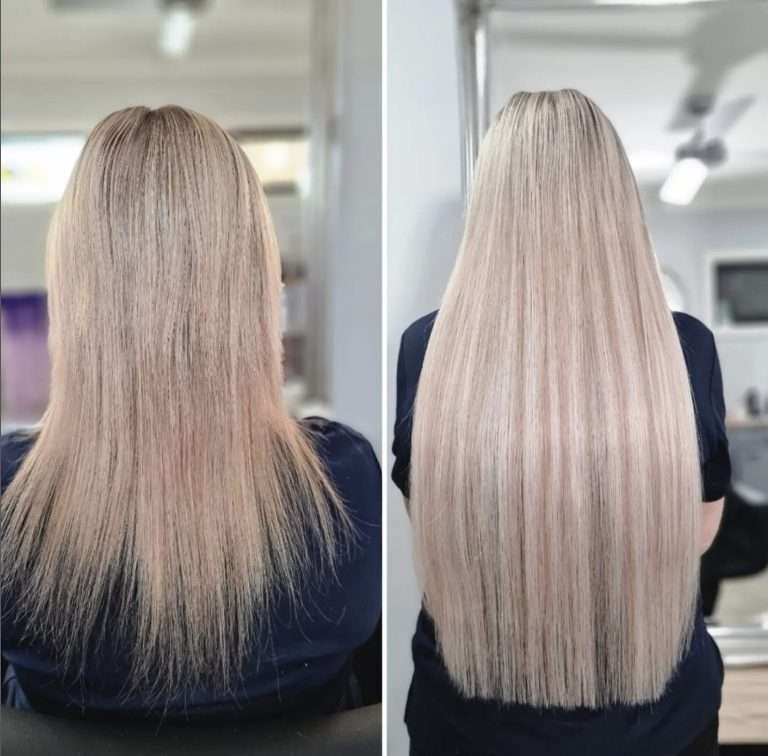 Back view showing the dramatic volume and length increase from professional platinum blonde hair extensions.